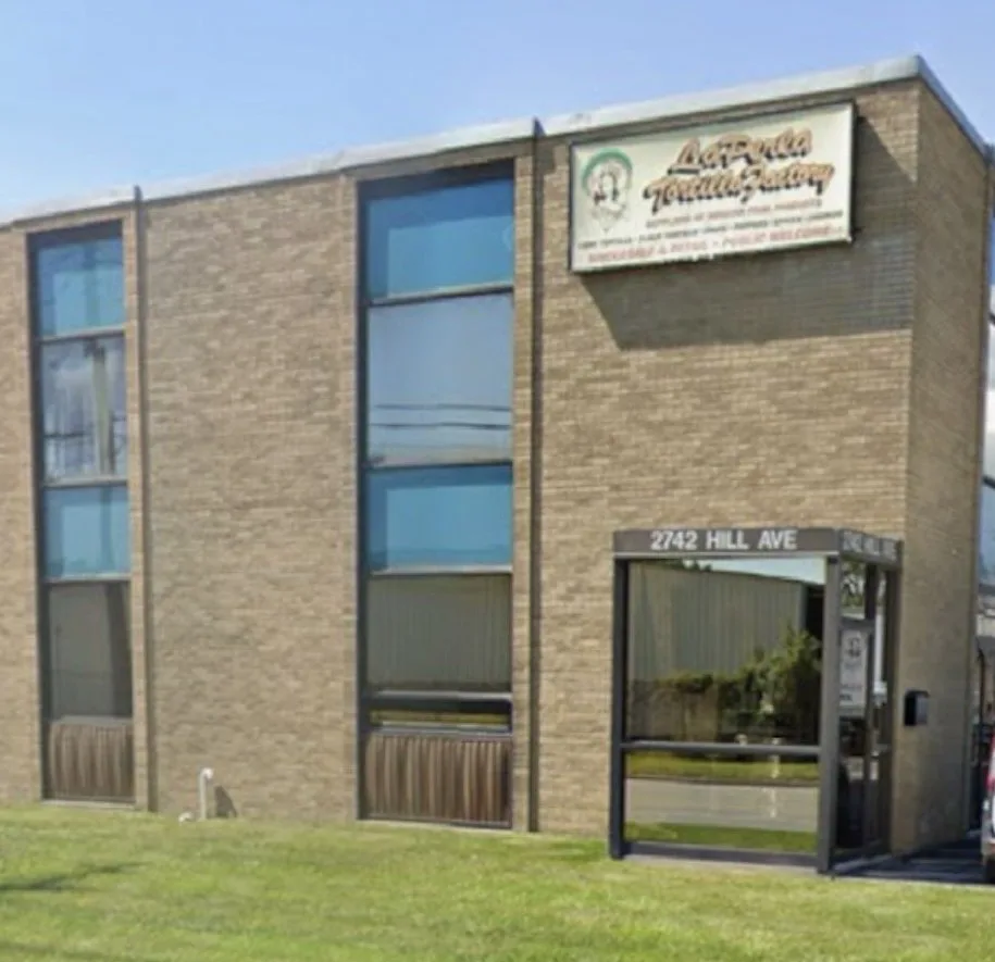 The La Perla Tortilla Factory storefront at 2742 Hill Ave in Toledo, Ohio